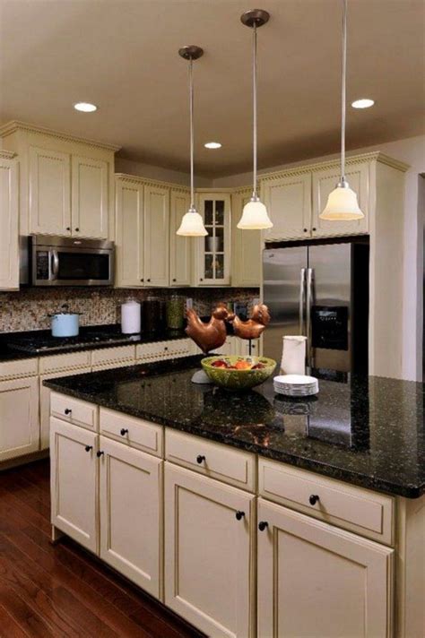 dark countertops with light cabinets